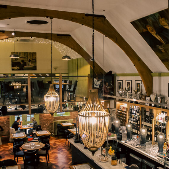 Sicily Restaurant’s intimate mezzanine space, elegantly set for private dining and celebrations, accommodating up to 24 guests.