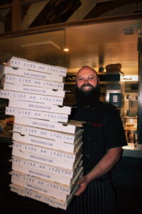 Freshly baked takeaway pizzas from Sicily Restaurant, crafted with authentic Italian ingredients and packed for enjoying on the go.